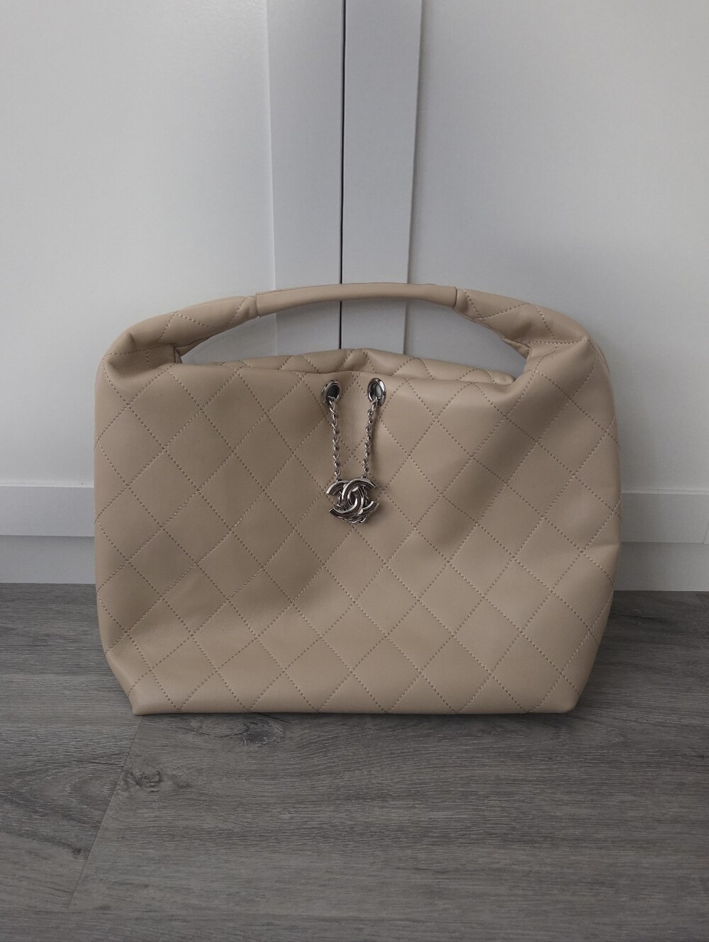 Beige Quilted Faux Leather Shoulder Bag with Chain Logo Drawstring